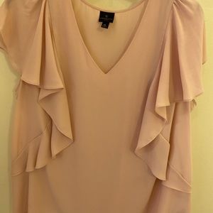 Ruffled sleeveless blouse
